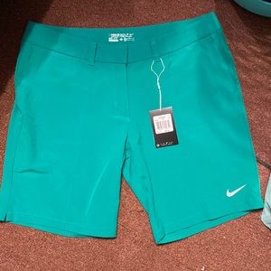 Womens Nike gold shorts size 12 green